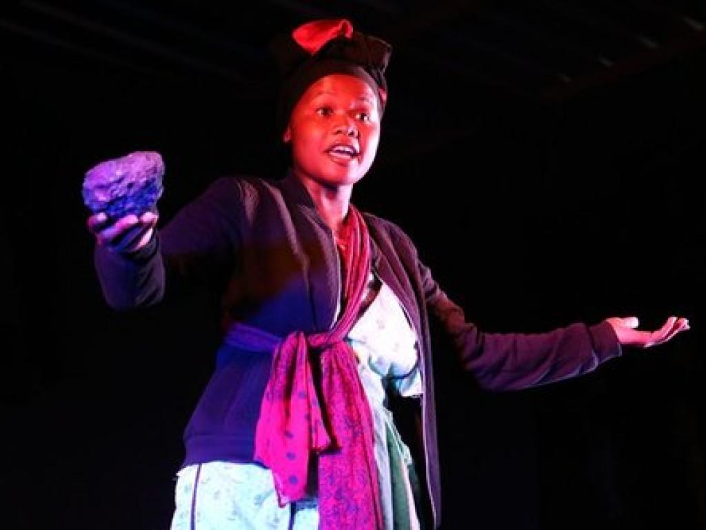 Woman standing with arms open